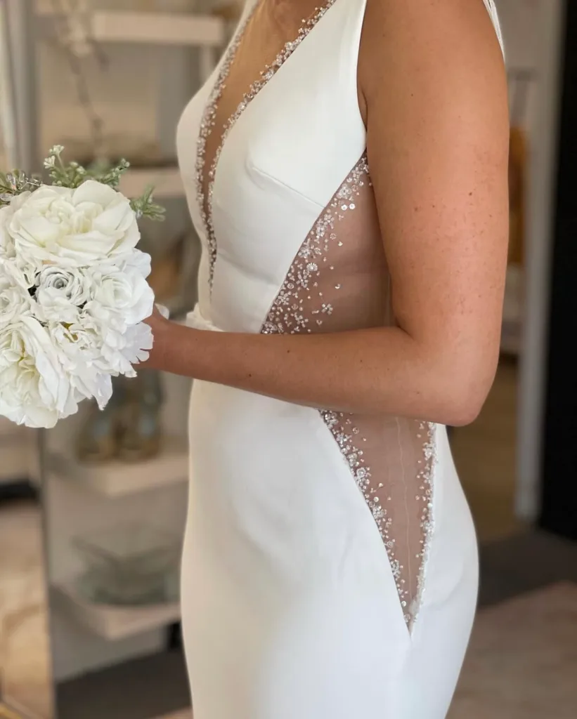 Bride beautiful dress holding flowers