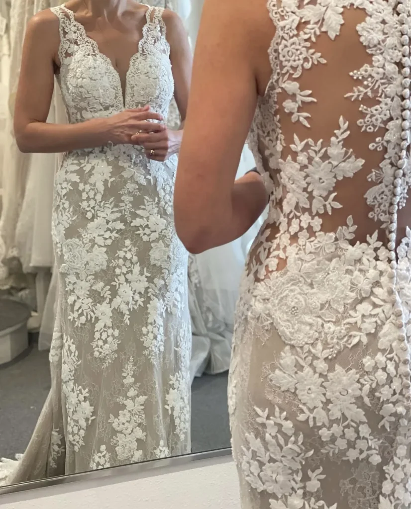 Bride checking in gown in the mirror